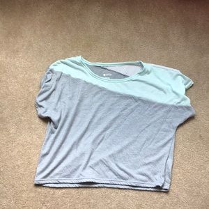 Girls short sleeve cropped shirt.